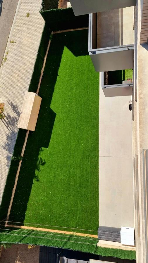 Apartamento diseño con jardín privado a 100 metros del mar Torredembarra Exterior foto